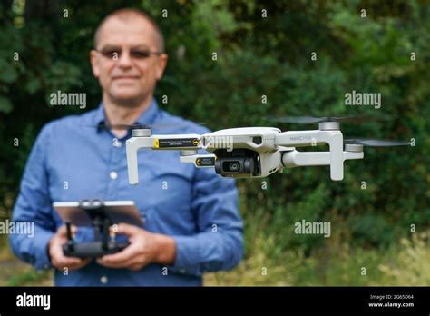 Flying drones hi-res stock photography and images - Alamy