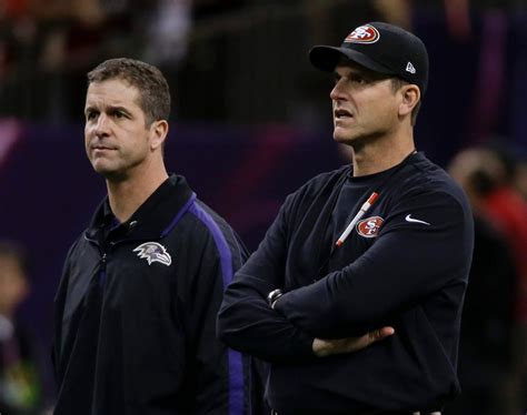 A Photo Of The Harbaugh Brothers Together In Deep Thought Before The ...