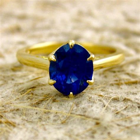 Blue Sapphire Solitaire Engagement Ring in 18K Yellow Gold