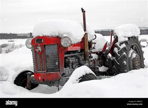 snow covered old tractor, Finland, Lapland Stock Photo - Alamy