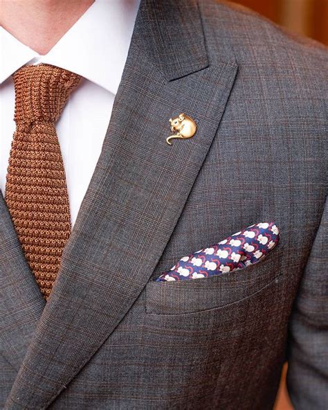 Discover the limited edition Lapel Pin and Pocket Square from our ...