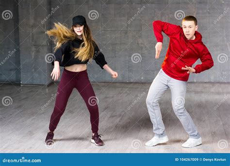 Attractive Couple Dancing Hip-hop. Stock Image - Image of adult, breakdance: 104267009