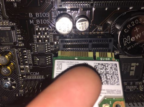 motherboard - Problems Inserting Wireless Card into Mini PCI express ...