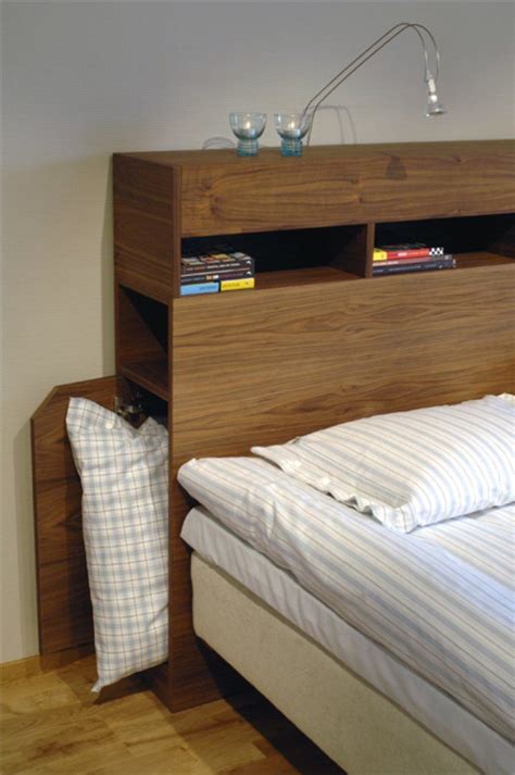 Storage in the headboard | Bed headboard storage, Headboard storage, Small room bedroom