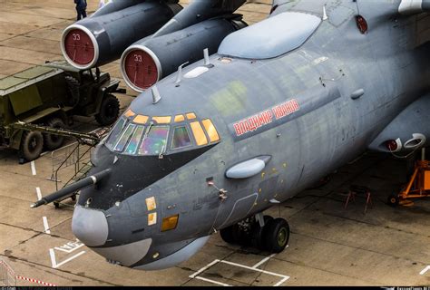 an air force jet sitting on top of an airport tarmac