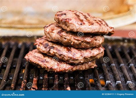 Pile of Grilled Ground Beef Patties on BBQ Stock Image - Image of ...