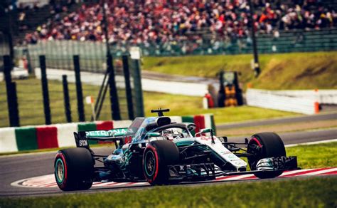 F1: Hamilton Wins Japanese GP As Vettel Crashes - CarandBike