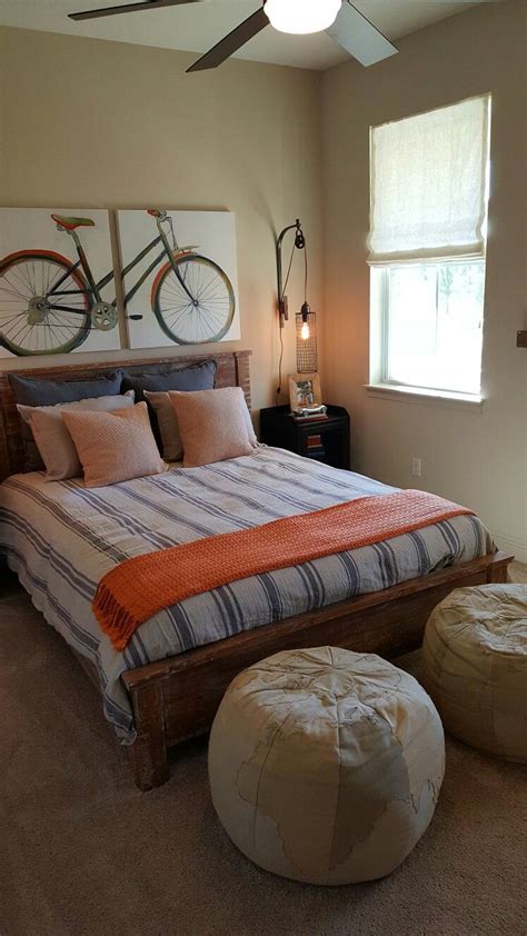 Bicycle themed bedroom in natural colors with orange accents in shabby chic style. Hamlin ...