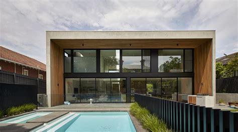 Contemporary suburban family home with concrete,… | Trends