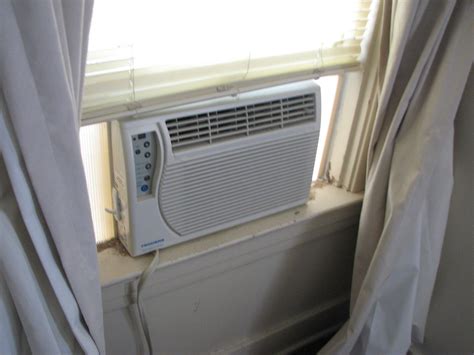 Window air conditioner | Inga Munsinger Cotton | Flickr