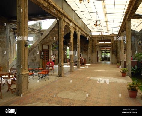 Tourists sitting inside the The Ruins, Bacolod, Philippines Stock Photo ...