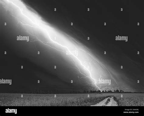 Dramatic Rain Sky With Rain Clouds On Horizon Above Rural Landscape ...