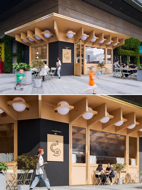 Large Orbs Of Light Surround The Exterior Of This Cafe And Bar