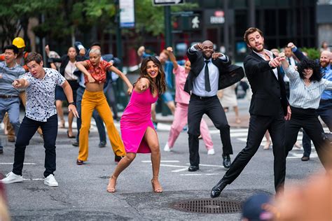 Liam Hemsworth, Rebel Wilson, and Priyanka Chopra Dance In The Street For Upcoming Movie | iHeart