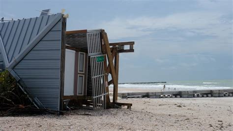 Scenes from Hurricane Helene: Flooding, damage and piles of sand on ...