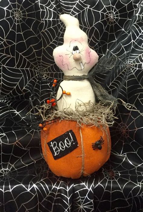 Boo pumpkin is a pattern by pattis ratties. He is 9 1/2 inches tall and I have hand painted his ...