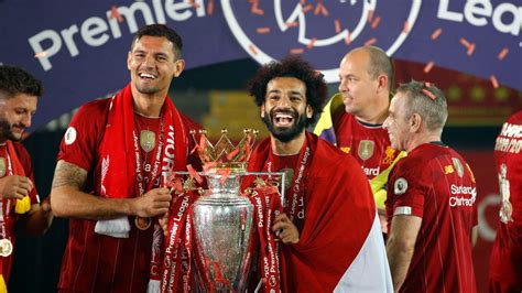 'Egyptian king' Mo Salah lifts trophy in national flag