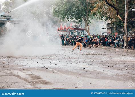 Protests in Chile editorial photography. Image of downtown - 163890342