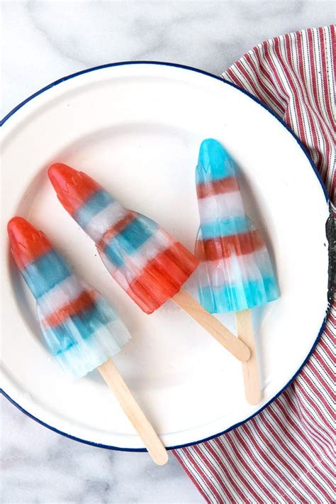 Red White & Blue Sports Drink Rocket Popsicles @boulderlocavore | Popsicle recipes, Popsicles ...