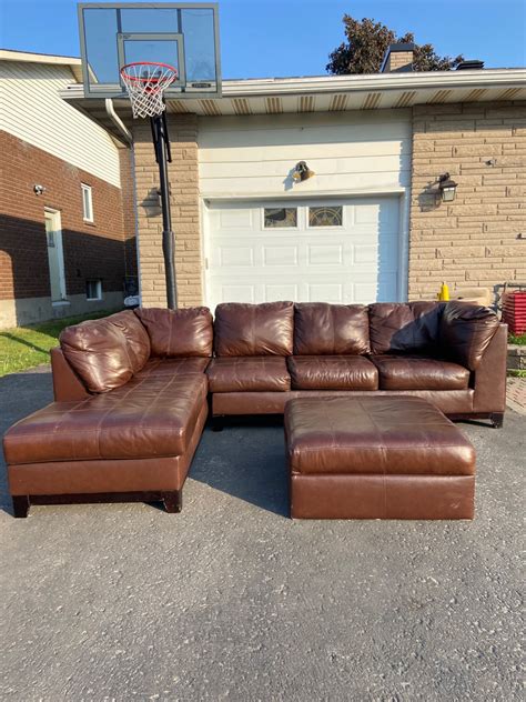 Ashley furniture brown leather sectional couch (delivery availab ...