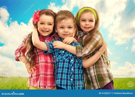 Cute Fashion Kids Hugging Each Other. Stock Image - Image: 41220217