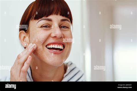 Sea salt never disappoints. Cropped portrait of an attractive young woman smiling while applying ...