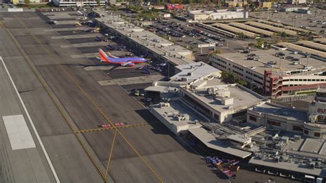 5K stock footage aerial video fly low over runway and approach ...