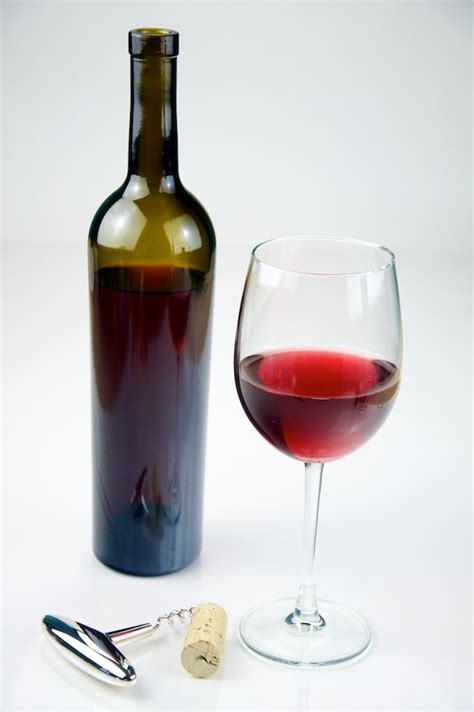 File:Glass of Red Wine with a bottle of Red Wine - Evan Swigart.jpg - Wikimedia Commons