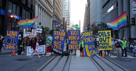 Photos: Inside the Raucous, Colorful Protest that Shut Down “Wall Street West” – Mother Jones