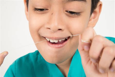 Tips For Teaching Kids About Flossing | Family Dental Health Center