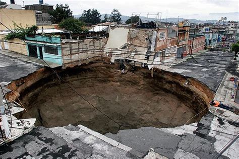 Giant sinkhole swallows 3-story building and house in Guatemala - syracuse.com