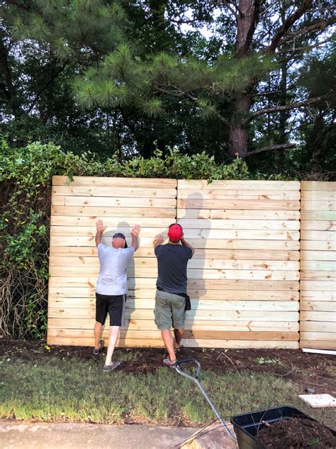 How to Build A Wood Fence On A Chainlink Fence - Bower Power