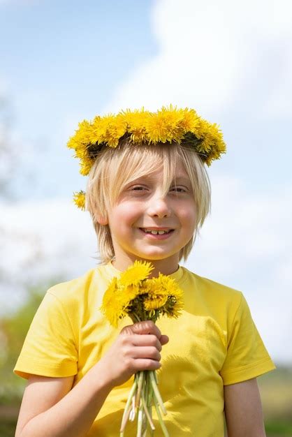 Premium Photo | Portrait of happy cheerful blond boy with wreath of ...