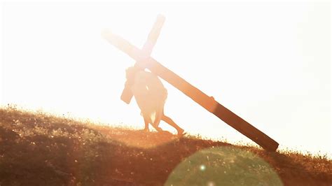 Representation of Christ carrying the cross road to Calvary hill. Stock Video Footage - Storyblocks