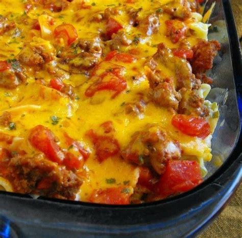 This Beef Lombardi is a hearty casserole with ground beef, egg noodles, cream cheese, tomatoes ...