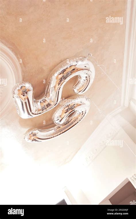 Silver number 65 balloons Stock Photo - Alamy