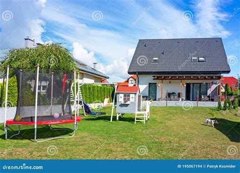 Garden Playground for Children at the Modern House Stock Photo - Image ...