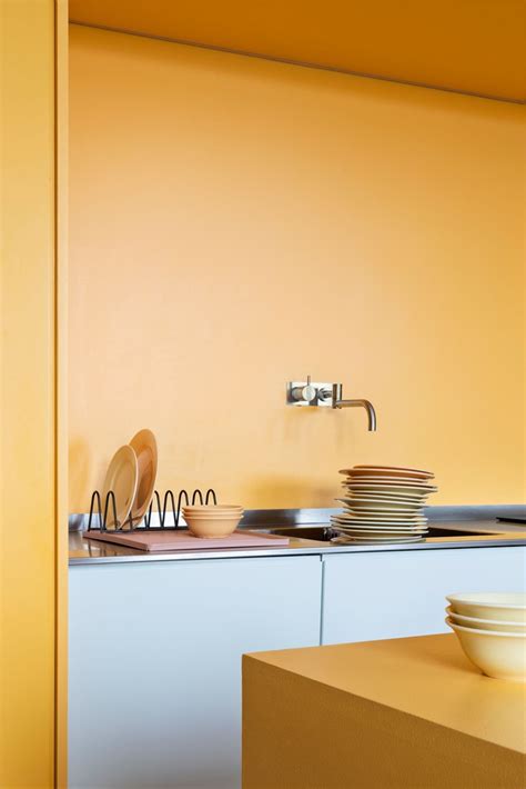 Canary Yellow Is Shockingly Cool in This Century-Old Swedish Apartment | Hunker