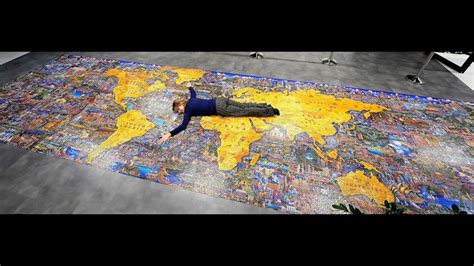 Dowdle 60000-piece What a Wonderful World, world's largest jigsaw puzzle (I 2023) hanged on the ...