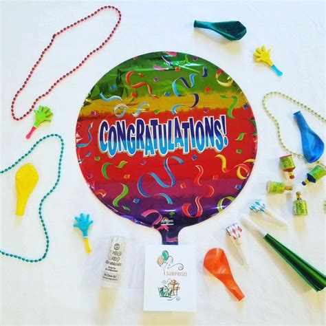 the congratulations sign is surrounded by confetti and beads