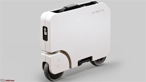 Honda unveils MotoCompacto: A mini suitcase-style e-scooter which fits ...