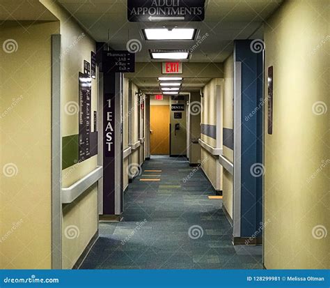 Clinic Hallway with Directional Signs and Lights Stock Image - Image of ...