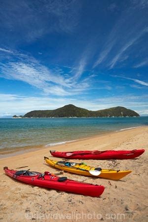 Kayaks on Observation Beach, and Adele Island, Abel Tasman National Park, Nelson Region, South ...