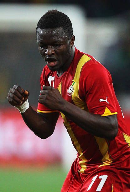 Sulley Muntari of Ghana celebrates scoring the opening goal with team mates during the 2010 FIFA ...