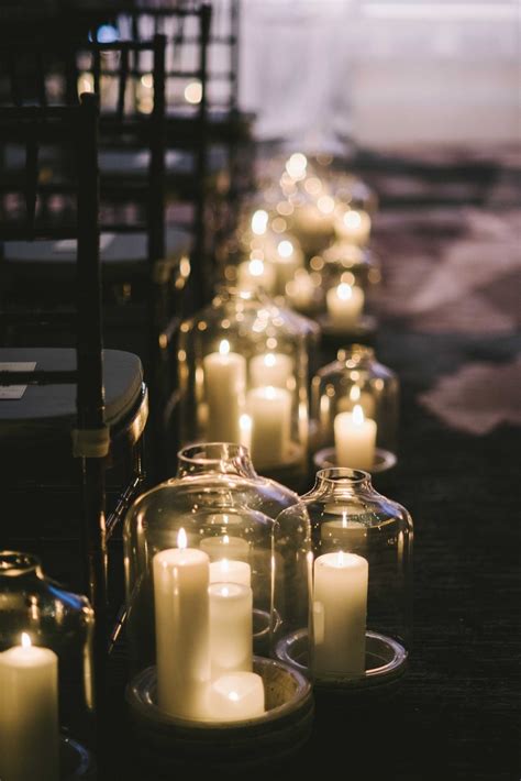 Ceremony Décor Photos - Pillar Candles in Large Vessels at Ceremony - Inside Weddings