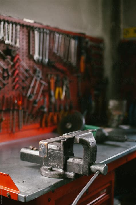 "Vice On A Metal Workbench" by Stocksy Contributor "Davide Illini ...