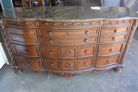 ASHLEY FLOOR MODEL CARVED FAUX MARBLE TOP DRESSER RETAIL $2574, MINOR ...