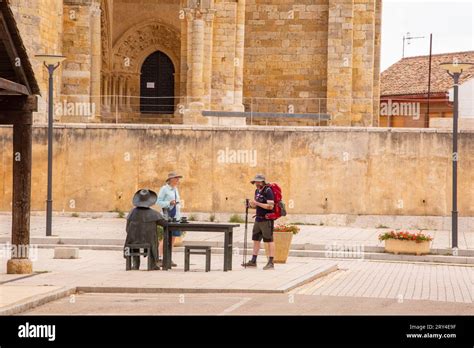 Pilgrims walking the Camino de Santiago pilgrimage route, the way of St ...