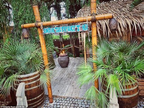 Husband transforms his garden into a tropical Tiki paradise for wife | Outdoor tiki bar, Tiki ...