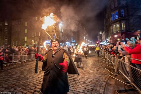 Hogmanay celebrations kick off in Edinburgh 40,000-strong torch procession | Daily Mail Online